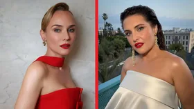 Morgana O'Reilly and Diane Kruger, each with a red lip