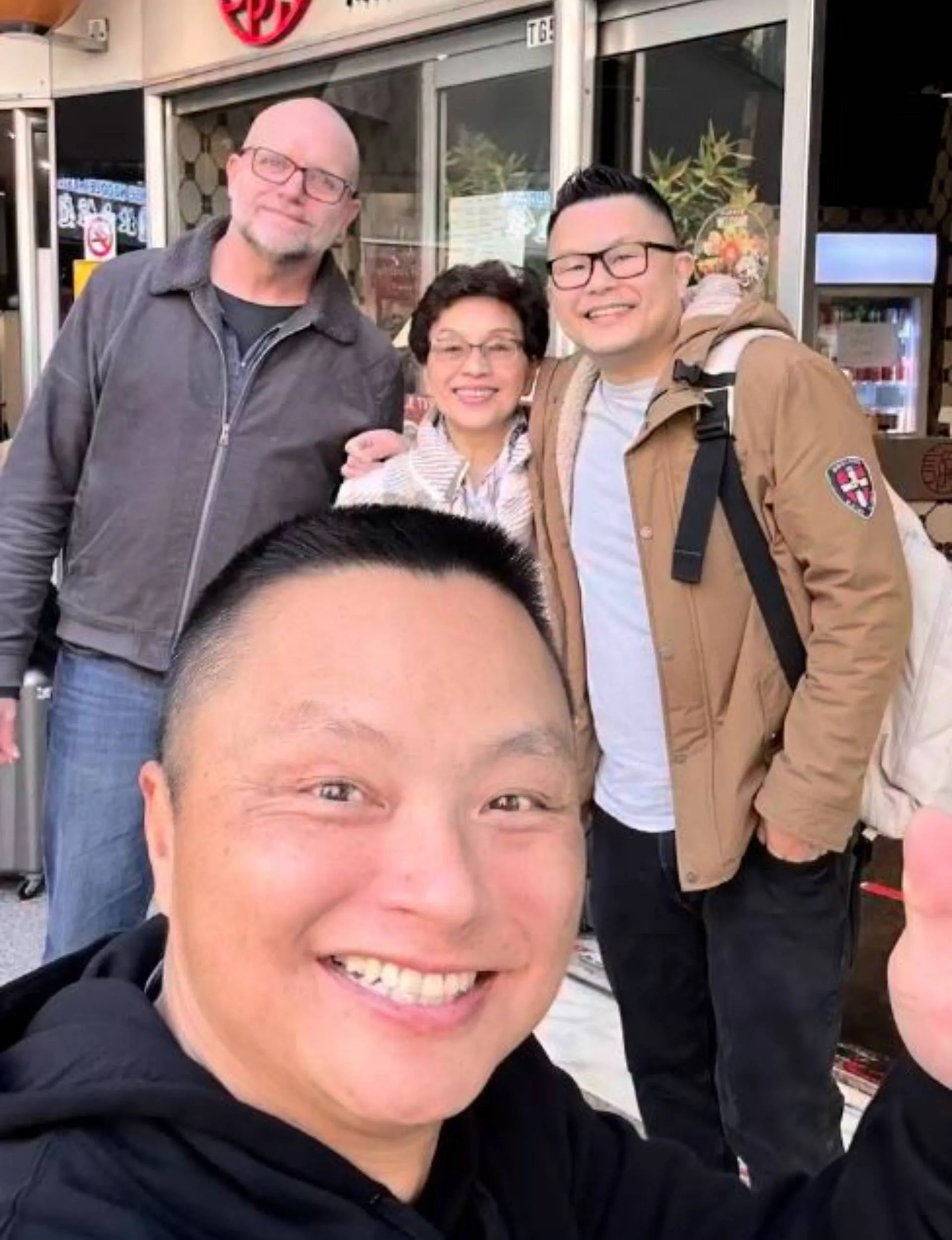 Jimmy with partner Jay, mum Anna and brother Dennis.