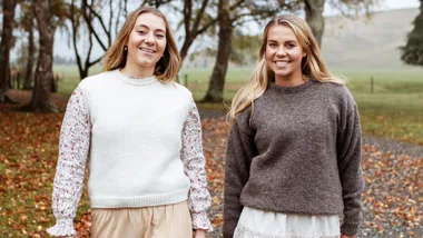 Anna and Kate Macdonald walking through their farm