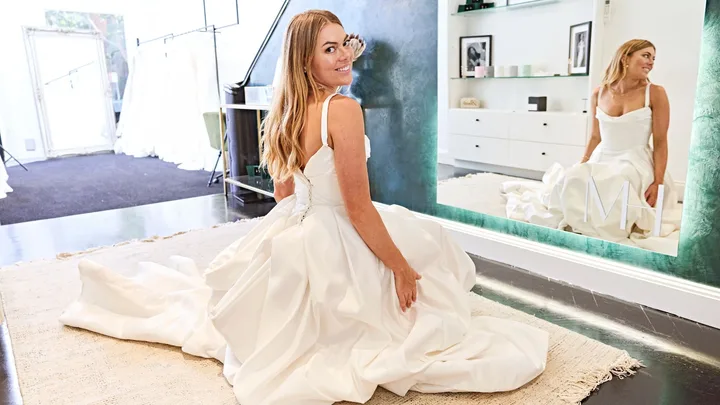 MAFS star Jacqui trying on a wedding dress