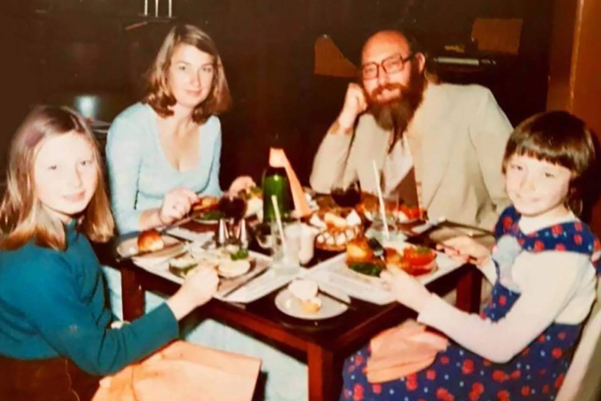 Kelly Tarlton with his family around the dinner table