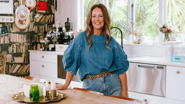 LeeAnn Yare leaning on her kitchen bench