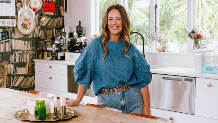 LeeAnn Yare leaning on her kitchen bench