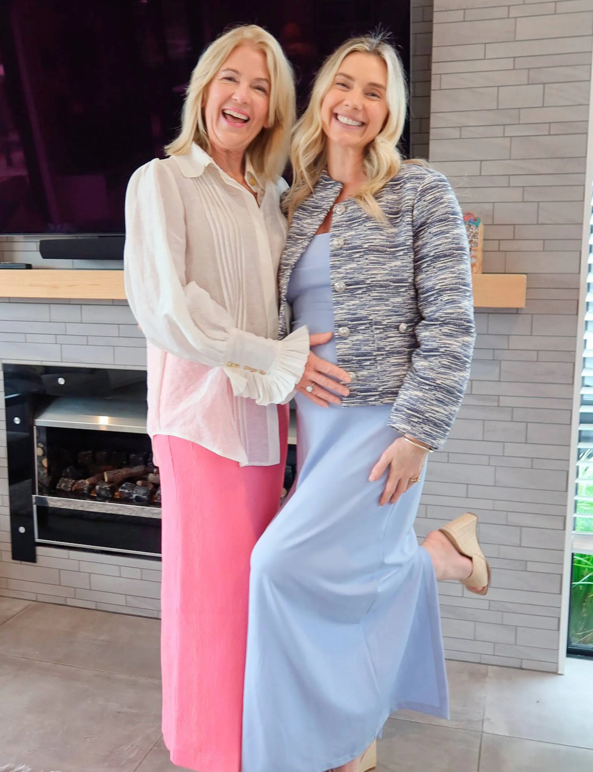 Caitlin Crisp with her mother holding her baby bump