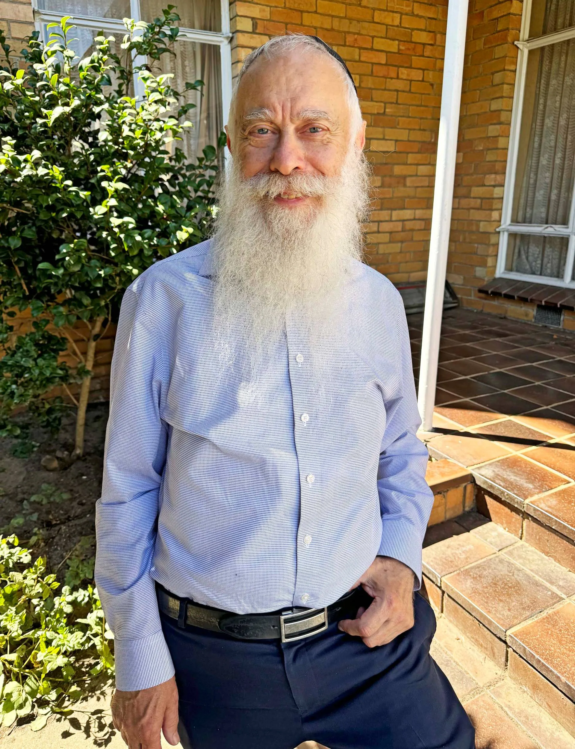 Raphael Aron in front of his church