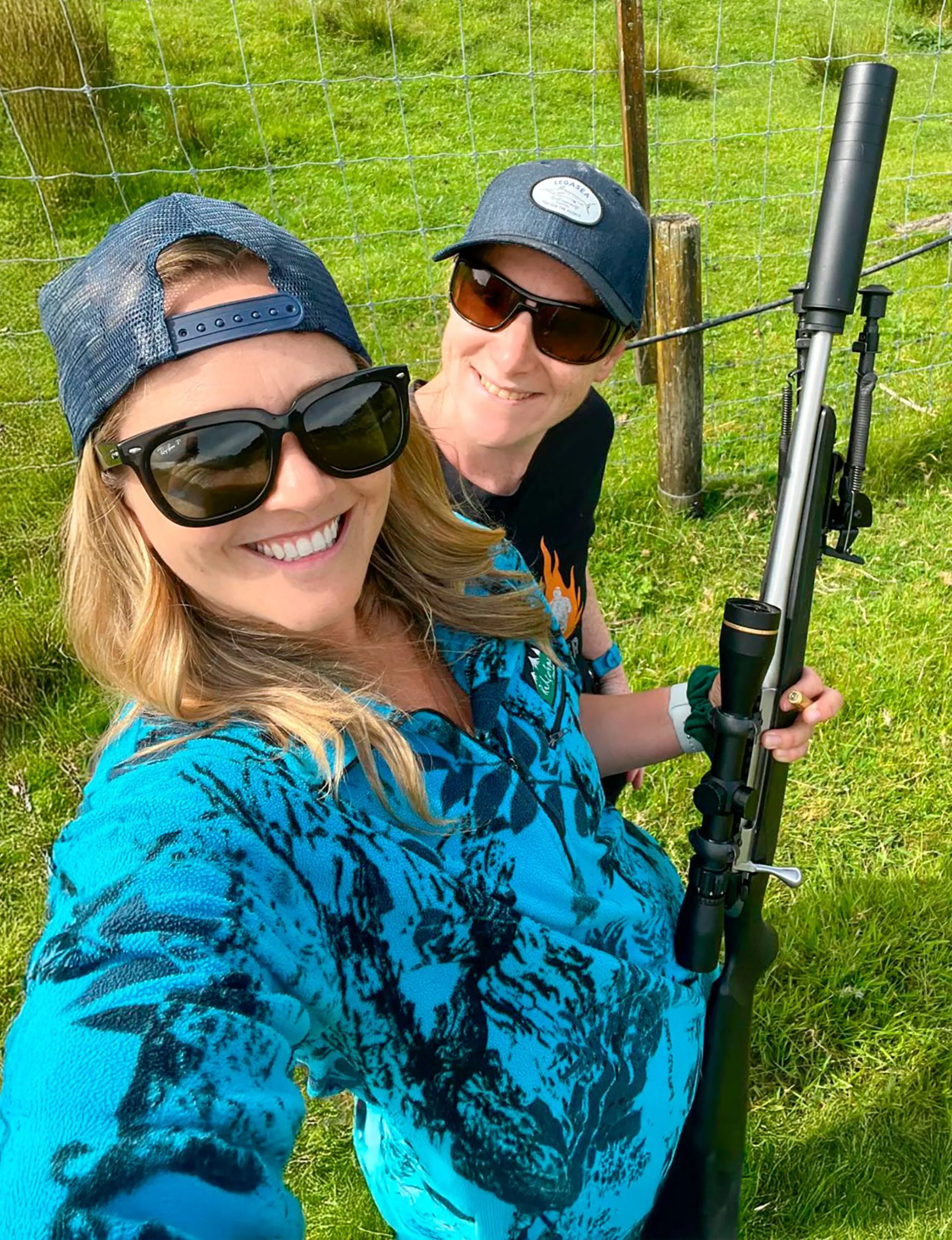 Wild Chix leaders Isabell and Shanel with a gun on a farm