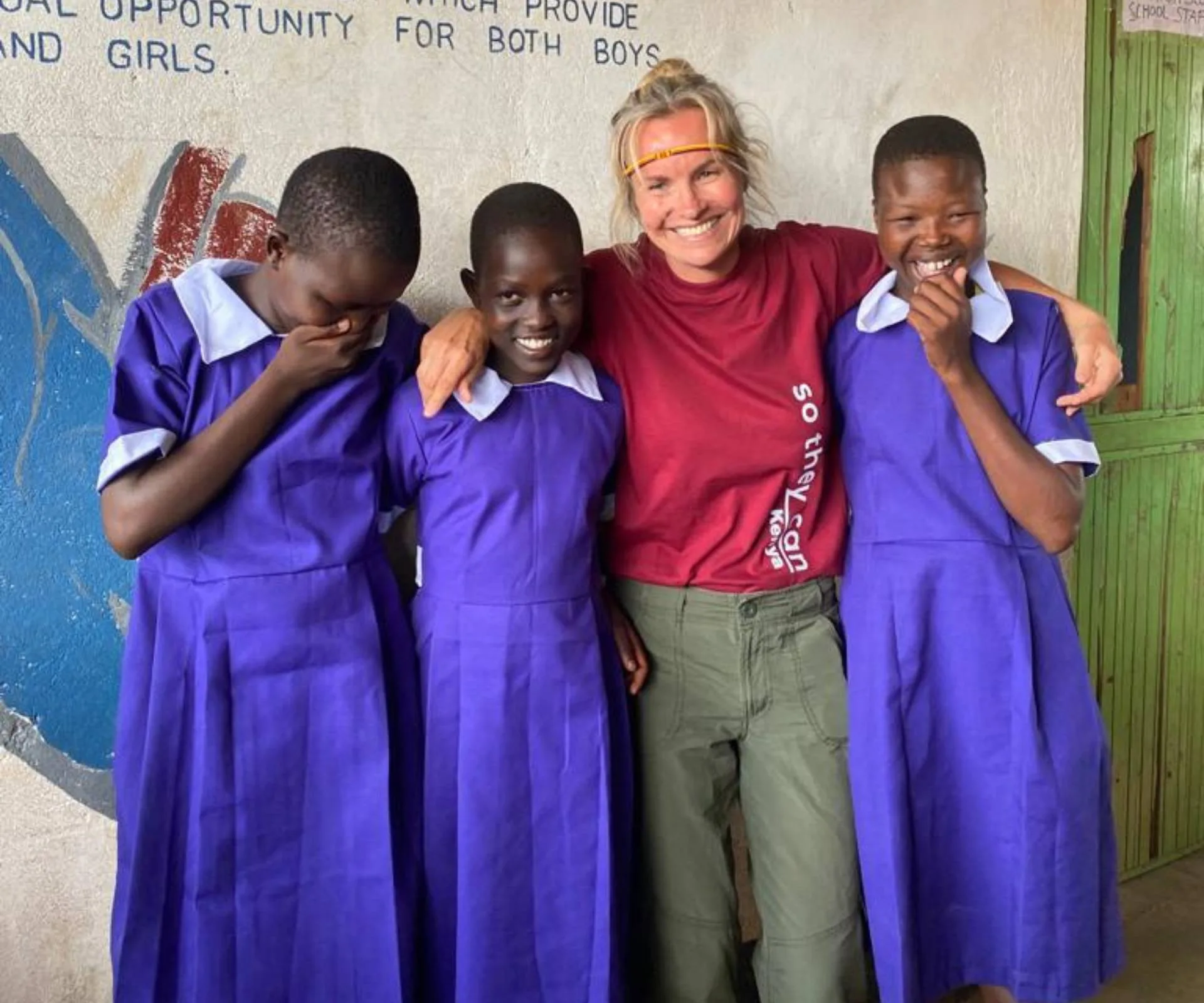 Cassandra Treadwell with three young African women