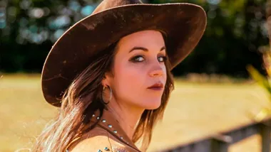 Steffany Beck wearing a cowgirl hat