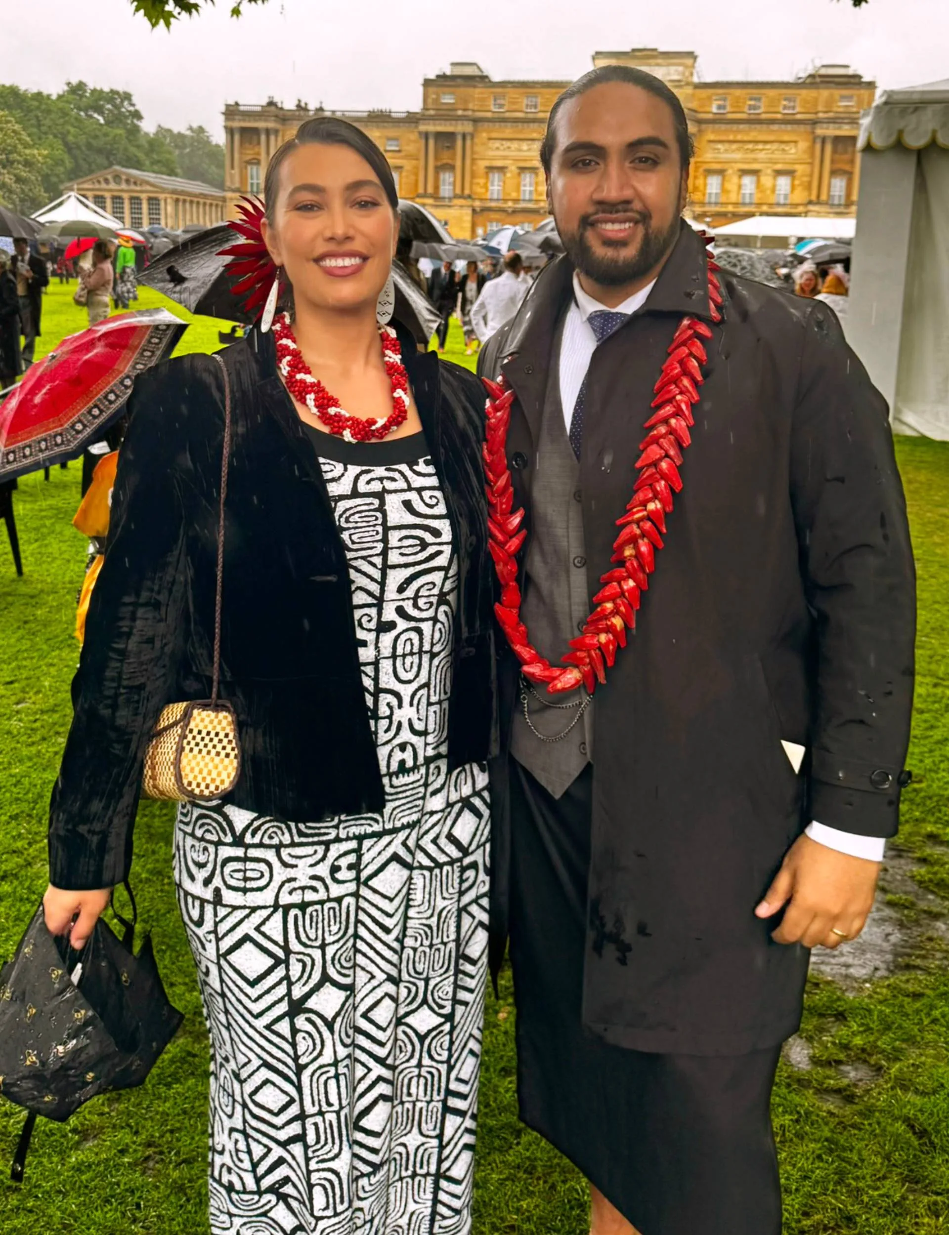 Benson Wilson and Isabella Moore in front of Buckingham Palace