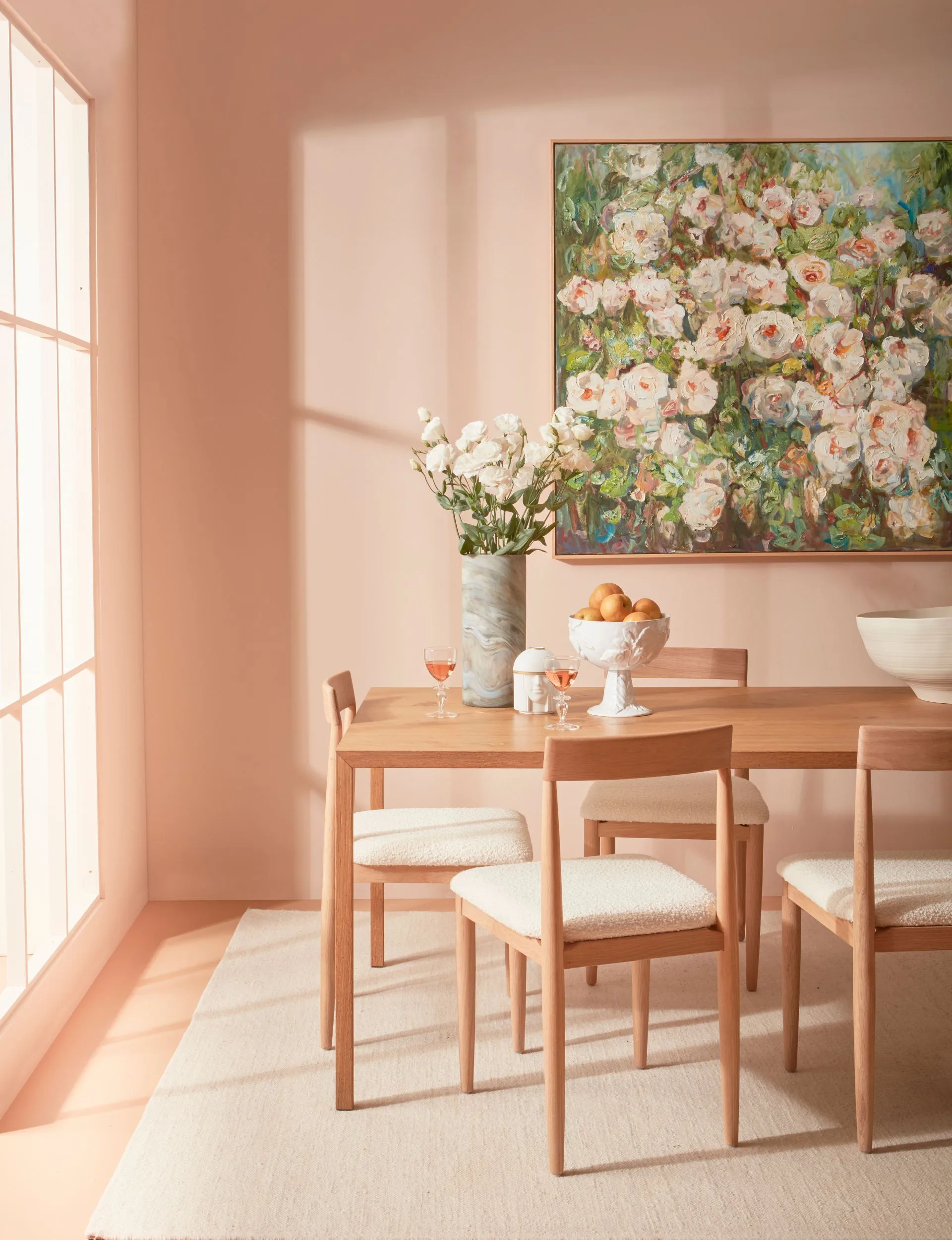 Natural light gives the neutral beige of these walls a stunning peach-hued glow, demonstrating that an all-neutral palette need not be lacking in colour or warmth. 