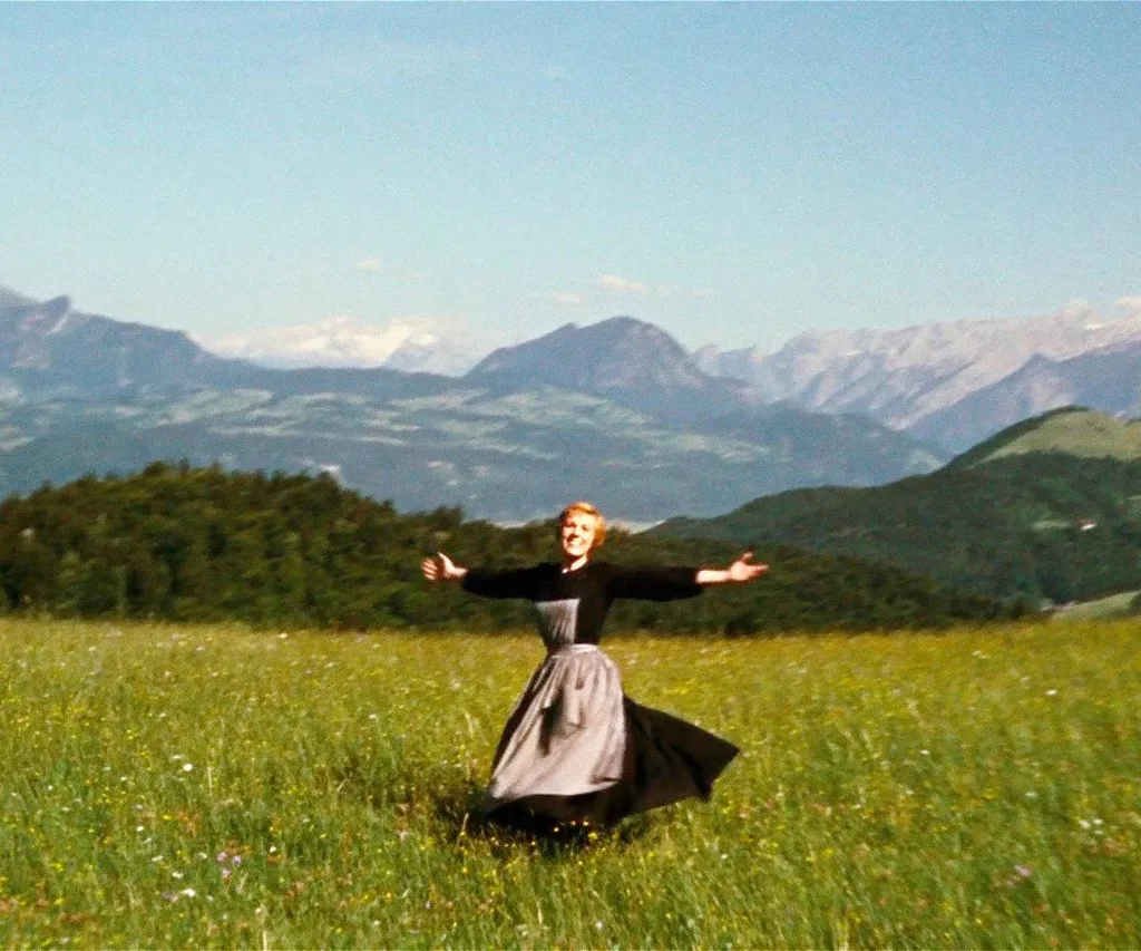 Julie andrews in a field