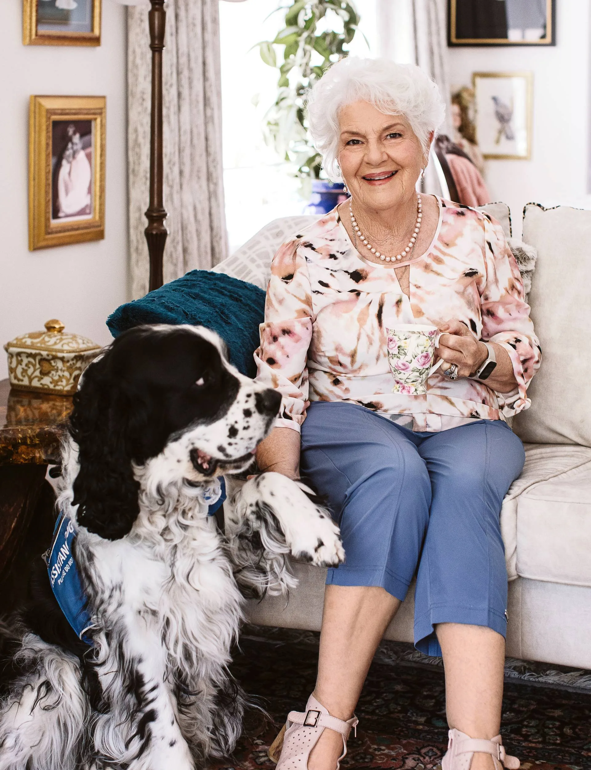 Dame having a cup of tea