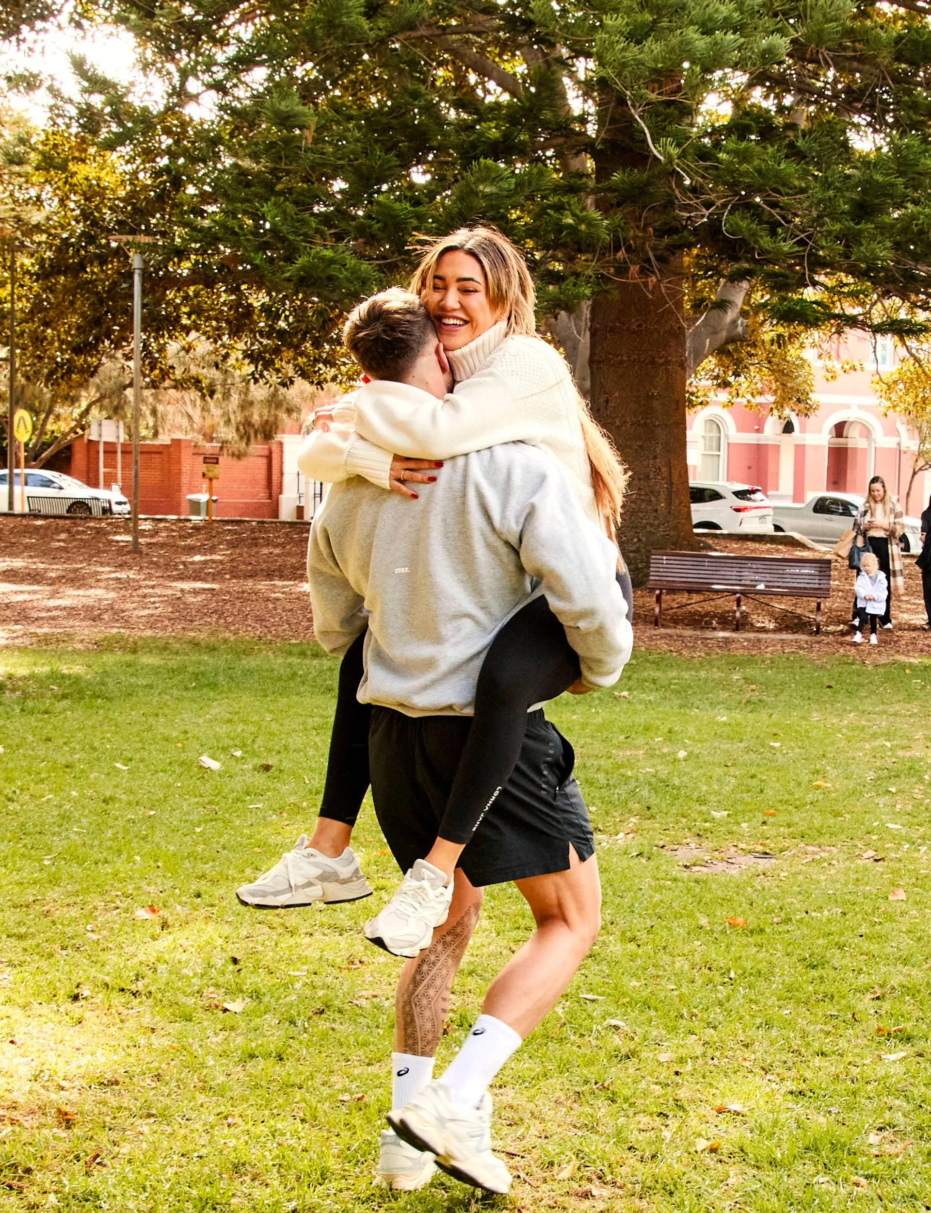 Billy and Awhina hugging in park