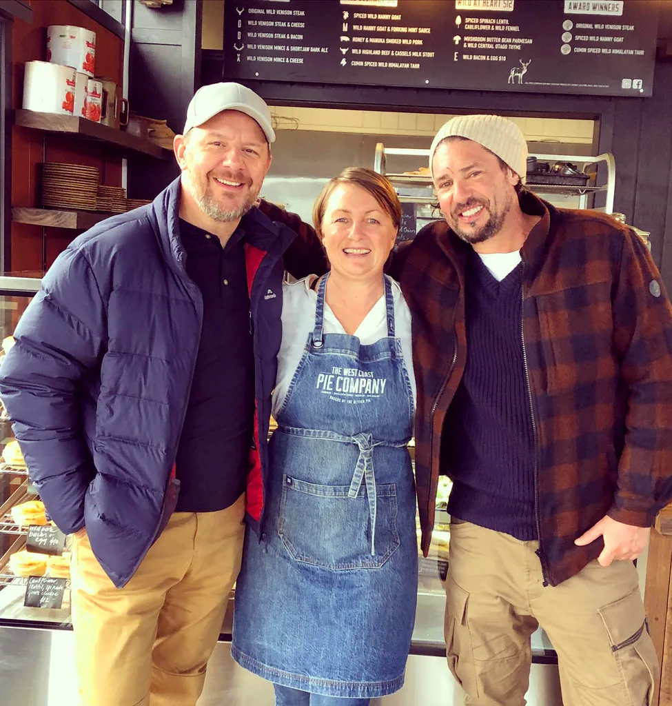 emily lucas standing with chefs colin fassnidge and manu fieldel