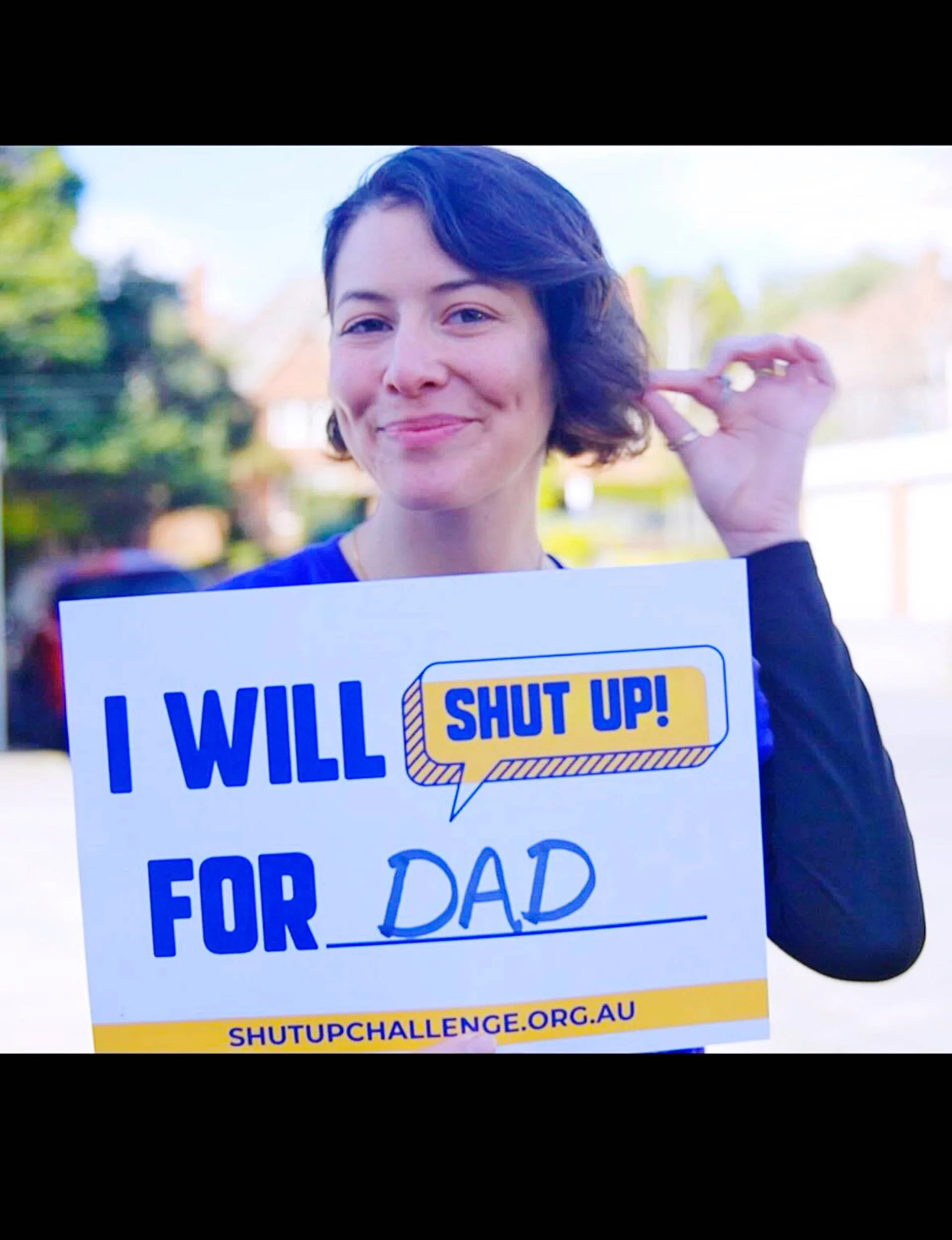 Sofia holding sign
