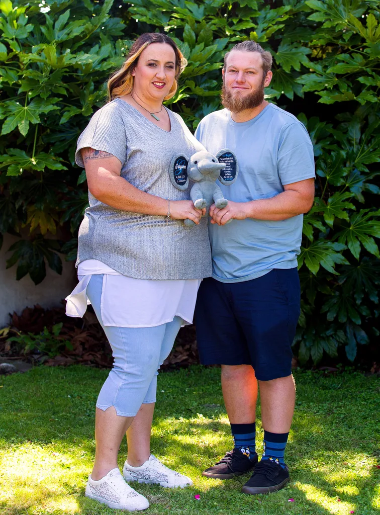 kylie and ben colling holding picture of soft toy