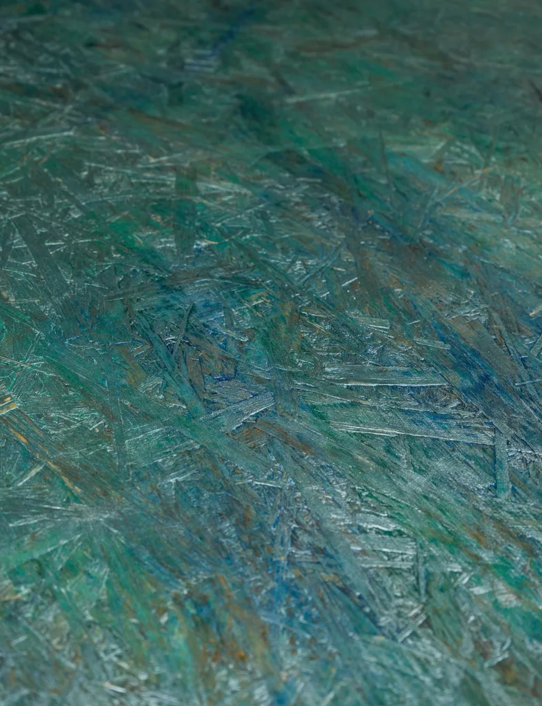 Upclose look at the pāua-inspired painted floor using blue, green and metallic paints from Resene