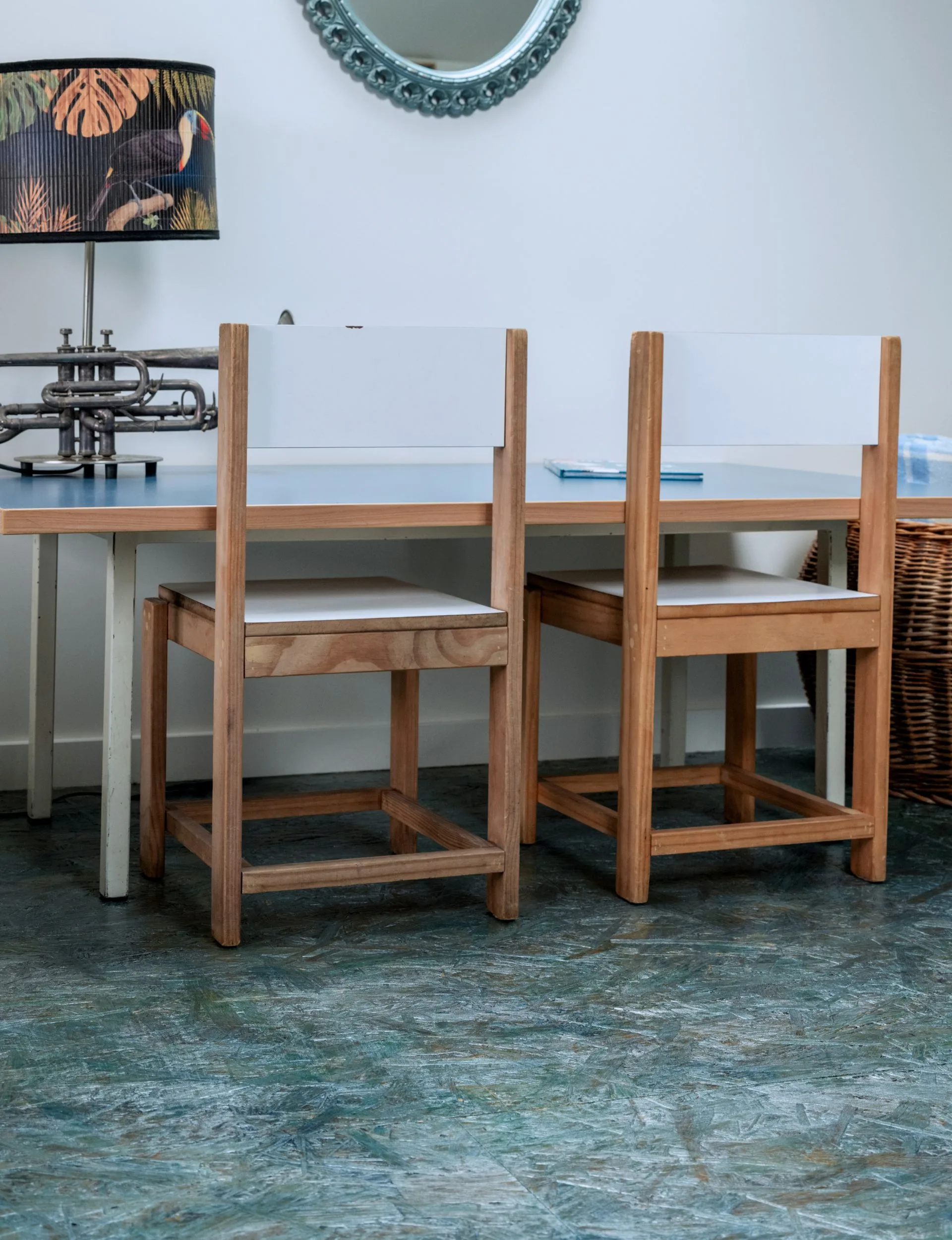The pāua-inspired painted floor using blue, green and metallic paints from Resene