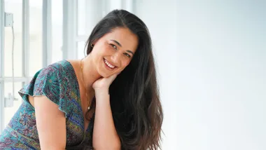 actress te ao o hinepehinga sitting in front of window with head in her hand