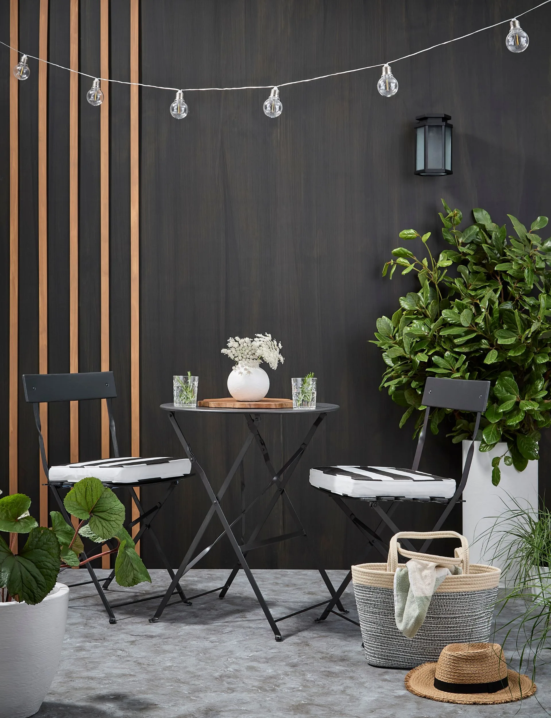 Giving the floor of your patio an interesting textured effect can immediately elevate it. This floor is painted using different shades of grey giving it a stone effect