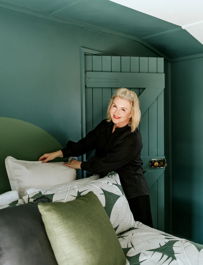 2025 Resene Colour Home Awards winner Bridgette created a faux headboard by painting a half circle in a light green