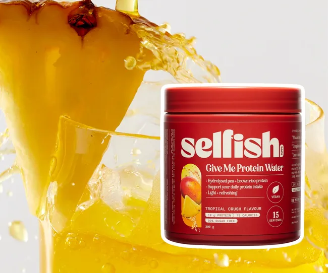 Selfish protein water container against a tropical drink backgrund
