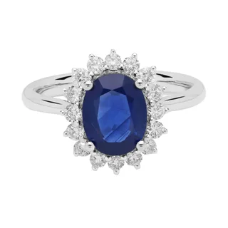 Sapphire and diamond oval sunburst halo Ring