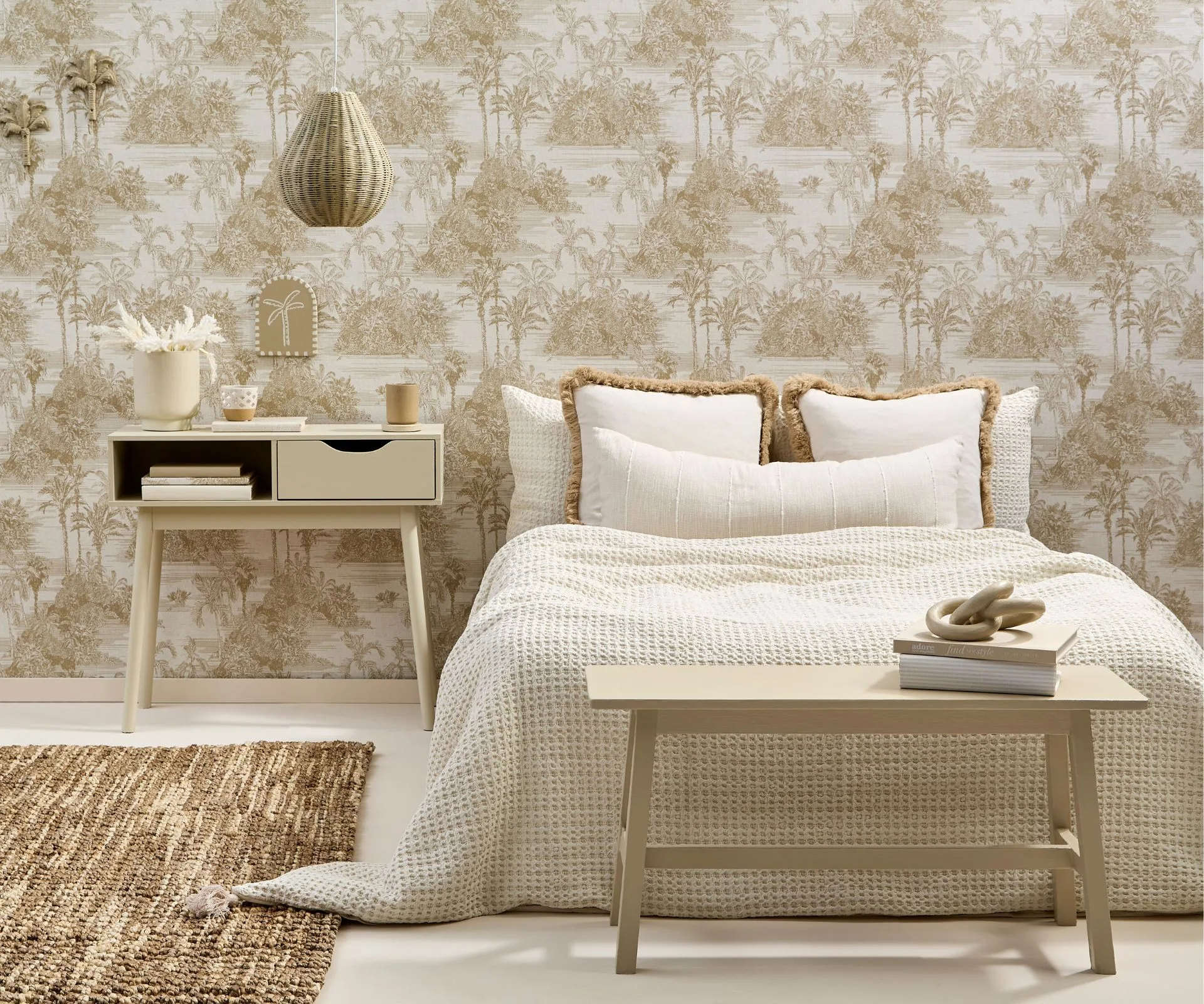 A neutral hotel-style chic with beige tones against a neutral printed wallpaper