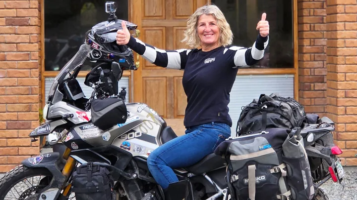 Kiwi rider Kathleen Perry tackles the world solo in tribute to late husbands