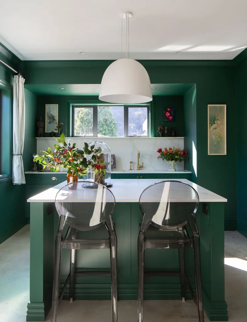 The green kitchen of this Arrowtown home is painted in Resene Bush