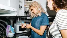 Woman checking food label