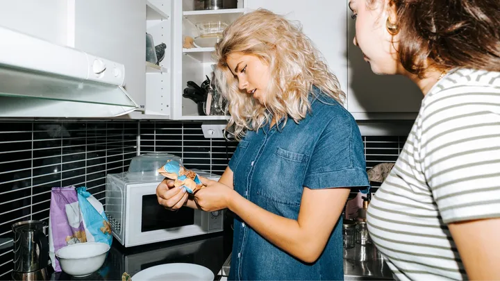 Woman checking food label