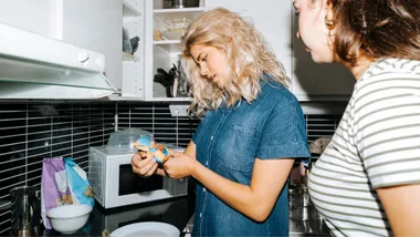 Woman checking food label