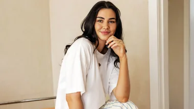 Jess Quinn in white t-shirt