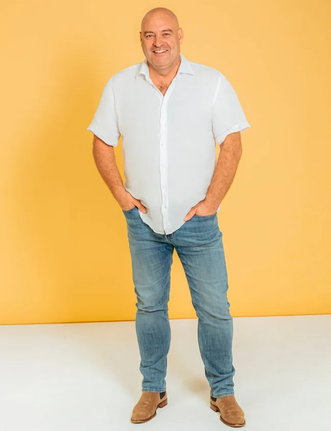 Man in white shirt hands in pocket