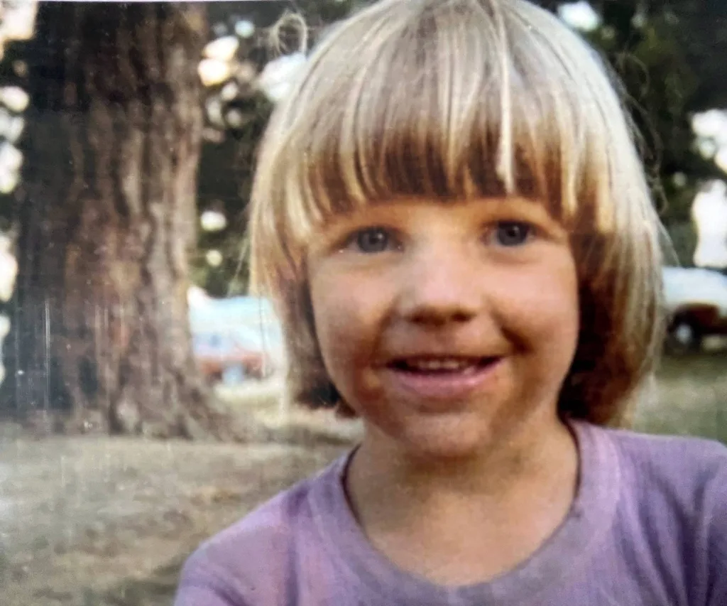 Little kid in purple shirt