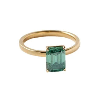 Emerald coloured moissanite engagement ring