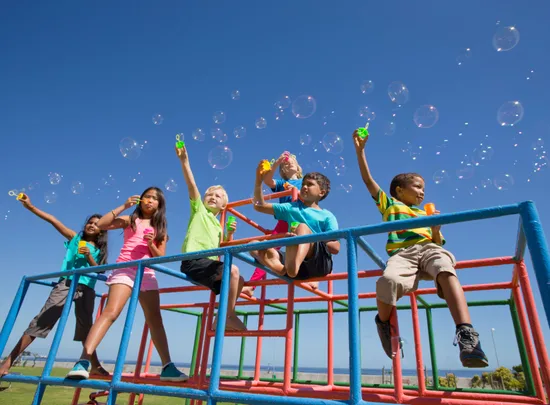 Kids blowing bubbles