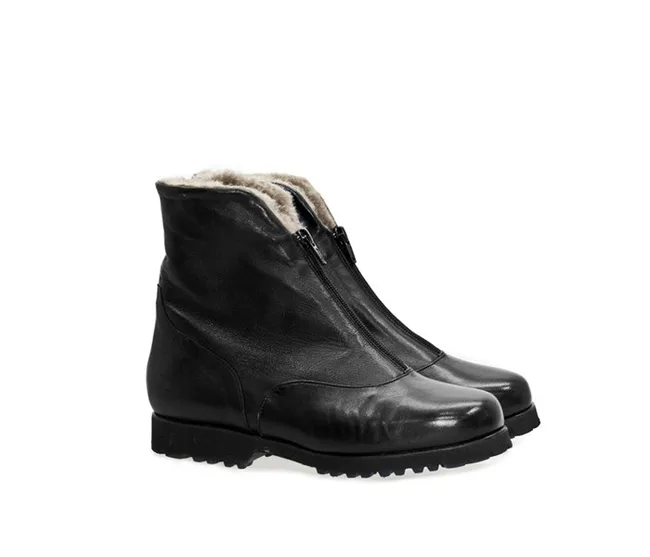 Black leather ankle boots with side zippers and fleece lining.