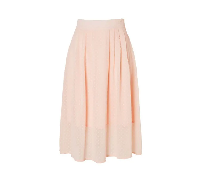 Pale pink pleated midi skirt with subtle dot pattern, against a white background.