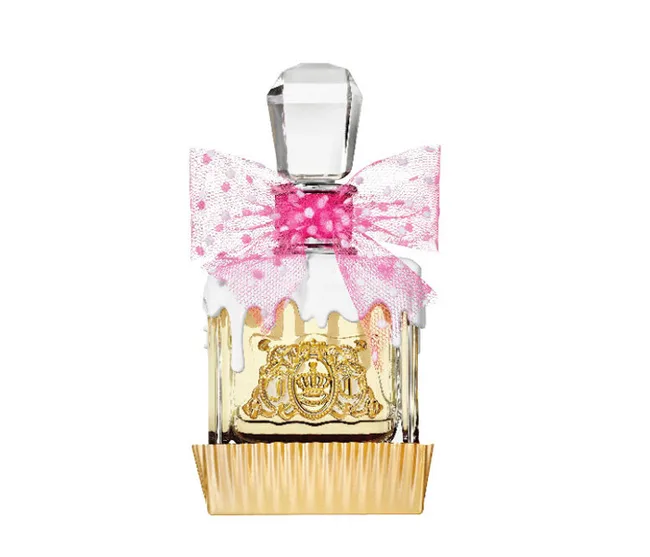 Juicy Couture perfume bottle with a pink polka dot bow and gold detailing.