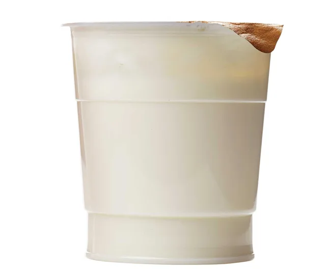A white plastic cup with a missing section in the top rim.