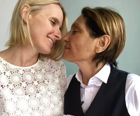 Elizabeth Gilbert and Rayya Elias hold commitment ceremony.