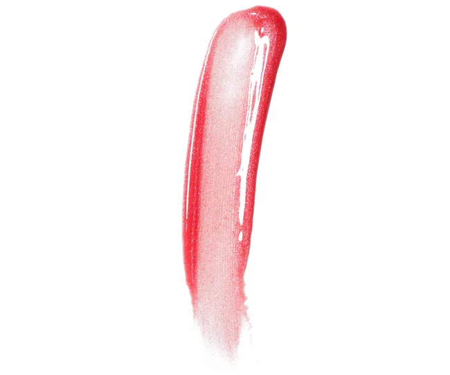 Brush stroke of pink shiny lip gloss on a white background.