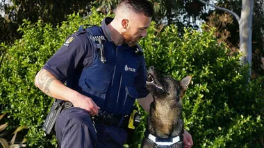 Hero cop Regan Mauheni and his adorable pet project