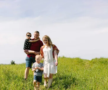 Two families who left Auckland for a better life in a smaller, more affordable town