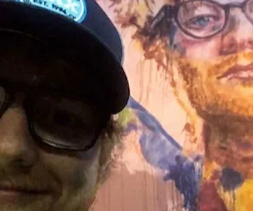 Ed Sheeran takes selfie with mural of own face