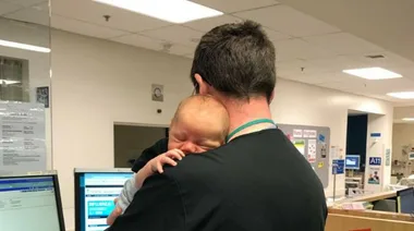 The emergency department surgeon who doubles as a baby whisperer