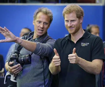 Harry and Meghan’s royal wedding photographer is “very much looking forward to” the big day