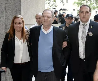 Harvey Weinstein charged with rape after turning himself into authorities in New York